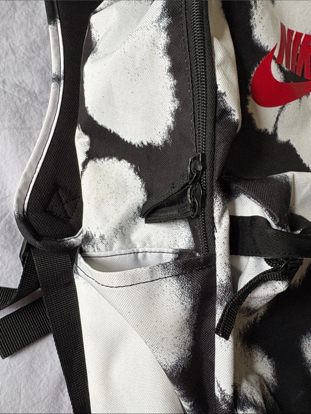 Nike Black & White Graphic Backpack with Red Swoosh